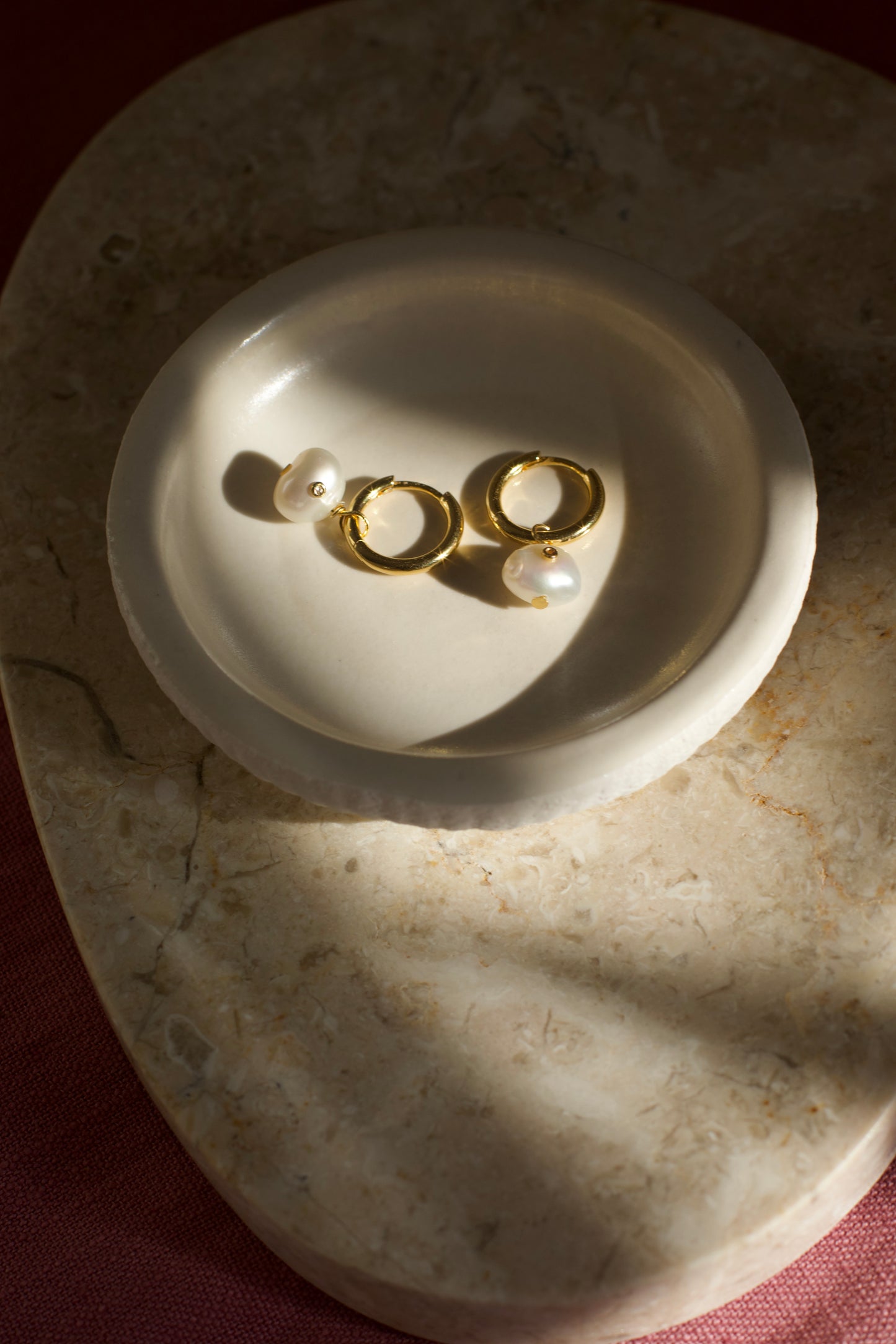 Clara White Pearl Huggie Earrings