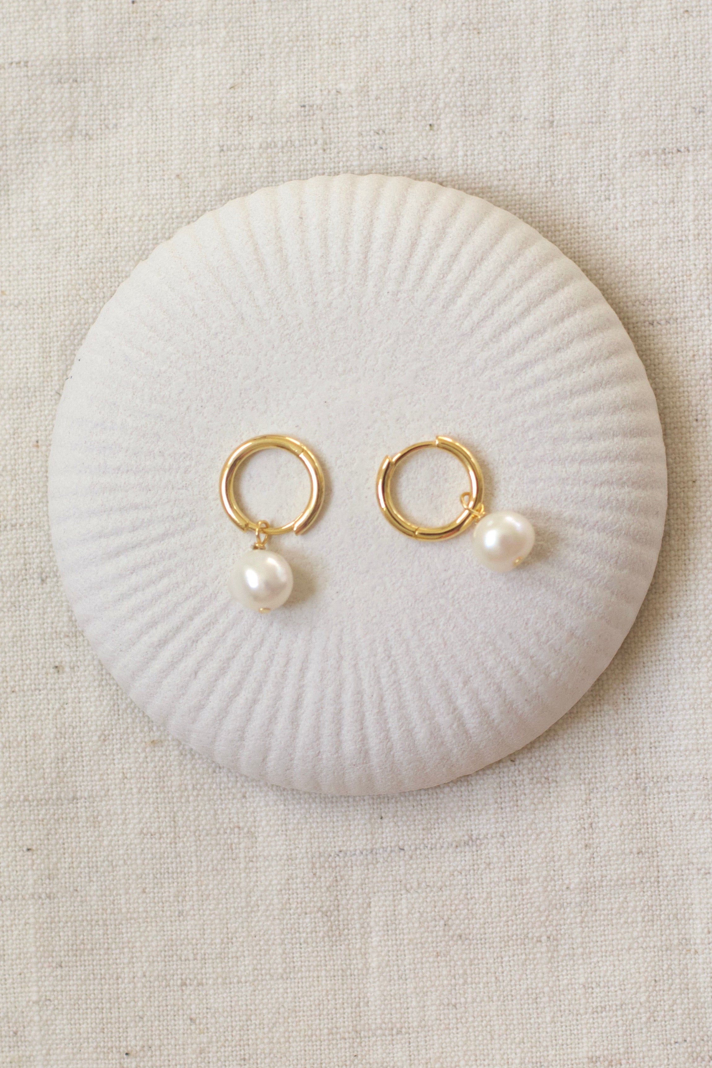 Clara Pearl Huggie Earrings